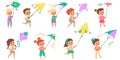 Kids with kites. Happy children fly color kite into sky collection, different colors design shapes, cute boys and girls Royalty Free Stock Photo