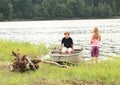 Kids by a lake