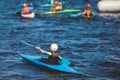 Kids learn kayaking, canoeing whitewater training in the lake river, children practicing paddling, young kayakers in summer camp Royalty Free Stock Photo