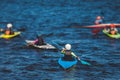 Kids learn kayaking, canoeing whitewater training in the lake river, children practicing paddling, young kayakers in summer camp Royalty Free Stock Photo