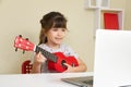 Kids learn music lessons online at home. Homeschooling and distance education for kids.