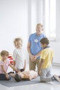 Kids learning to open airway Royalty Free Stock Photo