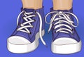 Kids legs in sneakers hand drawing