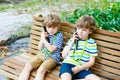 Kids listening to audio guide on excursion Royalty Free Stock Photo