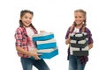 Kids little girls with braids hairstyle hold piles gift boxes. Children excited about unpacking gifts. Small girls Royalty Free Stock Photo