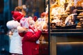 Kids looking at candy and pastry on Christmas market Royalty Free Stock Photo