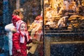 Kids looking at candy and pastry on Christmas market Royalty Free Stock Photo