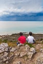 Kids Looking at a Storm