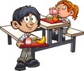 School boy and girl in uniform having lunch Royalty Free Stock Photo