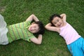 Kids lying on the grass