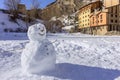 Kids made Snowman in Canillo village outdoor park. Andorra. Royalty Free Stock Photo