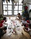 Kids making a Christmas DIY project