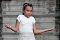 Kids Making A Decision Wearing Hair Band Near Wall