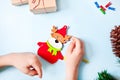 Kids making Deer decor for Christmas tree or gifts. Christmas handmade diy project