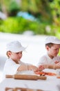 Kids making pizza Royalty Free Stock Photo