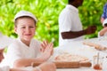 Kids making pizza Royalty Free Stock Photo