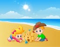 Kids making sand castle at the beach Royalty Free Stock Photo