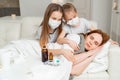 Kids in mask do not interfere ill mom sleep Royalty Free Stock Photo