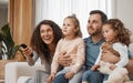 Kids, mother or father watching tv to relax or bond as a happy family in living room in Canada with love. Television Royalty Free Stock Photo