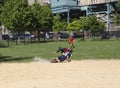 Kids from Mott Hall Science Academy play baseball in nearby Bronx Park