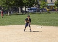 Kids from Mott Hall Science Academy play baseball in nearby Bronx Park