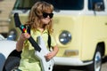 Kids musical instruments. Little street musician playing guitar on street. Rock music, pop music. Kids music concept