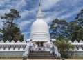 Kids near white buddhist stupa building located in Nuwara Eliya town Royalty Free Stock Photo