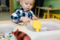 Kids in nursery blay with orbeez. Cute little children Royalty Free Stock Photo