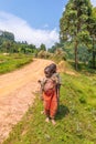 Kids in old ragged clothes in a rural area, Lake Mutanda, Uganda.