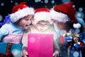 Kids open a magic present box Royalty Free Stock Photo