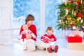 Kids opening Christmas presents Royalty Free Stock Photo