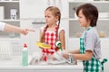 Kids ordered to do the dishes Royalty Free Stock Photo