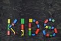 KIDS out of colorful wooden toy blocks on black Royalty Free Stock Photo