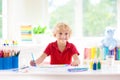Kids paint. Child painting. Little boy drawing Royalty Free Stock Photo