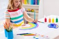 Kids paint. Child painting. Little girl drawing Royalty Free Stock Photo