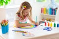 Kids paint. Child painting. Little girl drawing Royalty Free Stock Photo