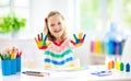Kids paint. Child painting. Little girl drawing Royalty Free Stock Photo