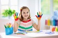 Kids paint. Child painting. Little girl drawing Royalty Free Stock Photo