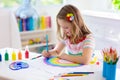 Kids paint. Child painting. Little girl drawing Royalty Free Stock Photo