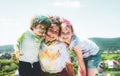 Kids painted in the colors of Holi festival.