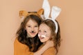 Kids with painted faces in guise of rabbit and tiger. Zodiac 2023 year according to Chinese calendar.