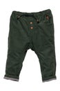 Kids pants isolated. Close-up of a stylish fashionable dark green corduroy trousers with ribbon bow for the little boy. Childrens