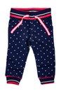 Kids pants isolated. A stylish fashionable dark blue denim trousers with white dots for the little girl. Children sport trousers