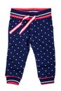 Kids pants isolated. A stylish fashionable dark blue denim trousers with white dots for the little girl. Children sport trousers