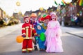 Kids and parents on Halloween trick or treat Royalty Free Stock Photo