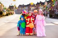 Kids and parents on Halloween trick or treat