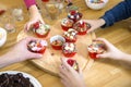 Kids Picking Cupcakes At Table