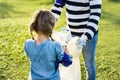 Kids picking up trash in the park