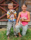 Kids with piglet Royalty Free Stock Photo