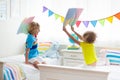 Kids pillow fight. Bedroom for two children Royalty Free Stock Photo